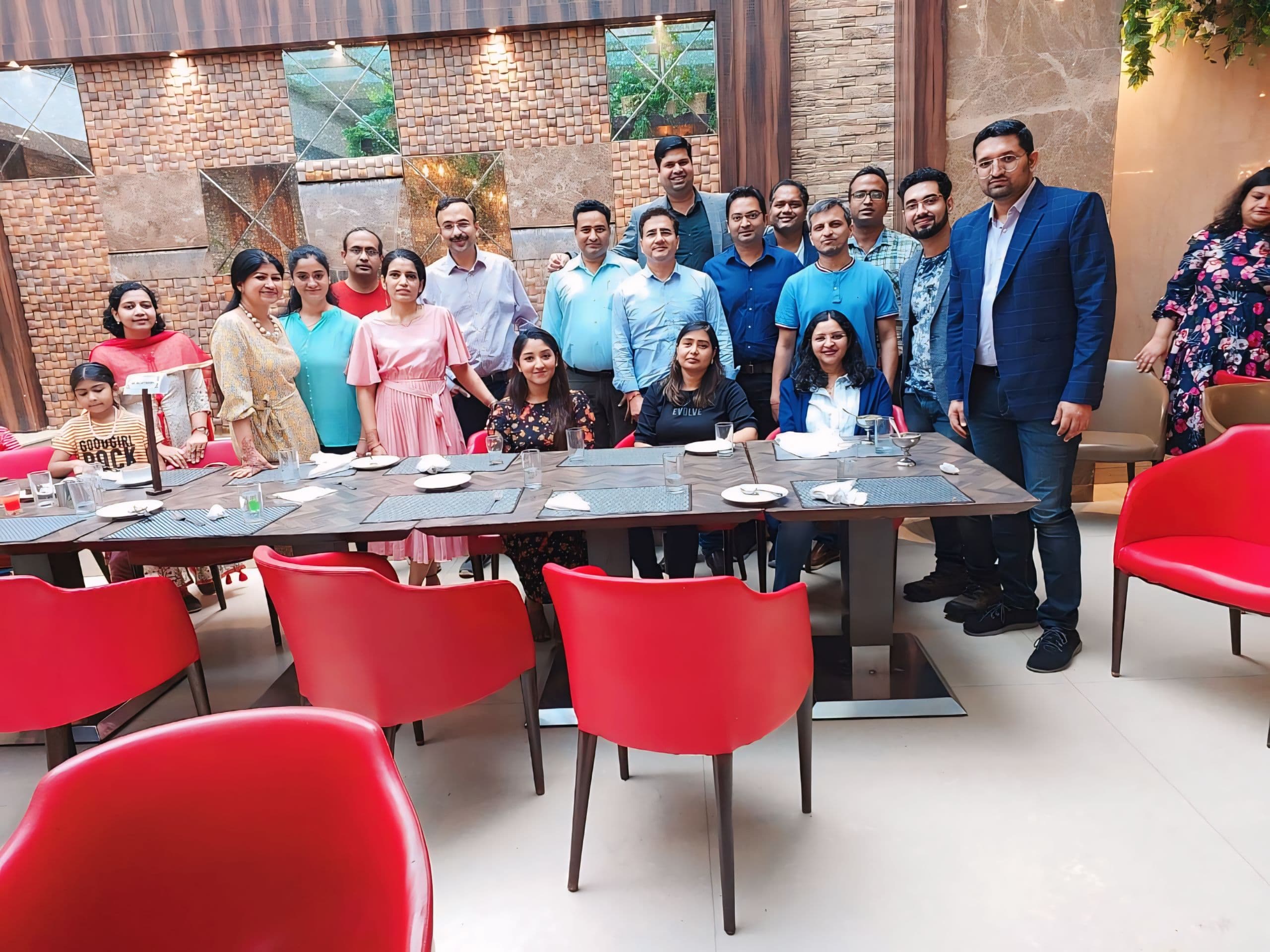 Group photo of Dr. S. Hussain with fellow physicians at a medical education conference dinner gathering